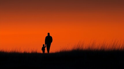 Fototapeta premium Silhouette of father carrying son in sunset park, minimalist lifestyle image for emotional storytelling and decor