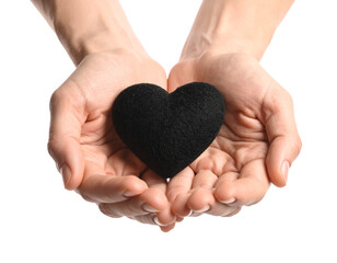 Obraz premium Black Soft Heart Cradled Gently in Two Human Palms, isolated on white background