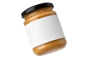 Glass jar with peanut butter and blank white label on transparent background, concept for food packaging design and branding