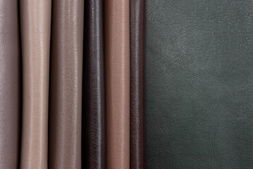 Palette of multi-colored pieces of genuine leather. Accessories for sewing. Leather material