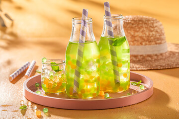 Cold bubble tea made of juice, fruits and pearls.