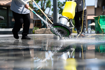 cleaning floor with machine