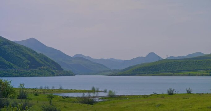 The lake between the green mountains is a unique natural landscape. Bingol, Turkiye