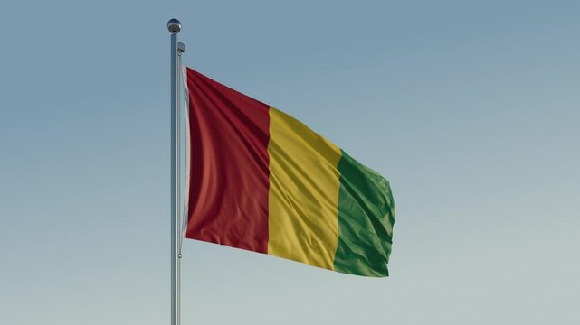 Guinea Conakry Flag seamless loop Cinematic Realistic Waving Blue Sky