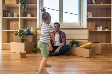 Single father embraces fresh start with his young daughter in their new apartment after...