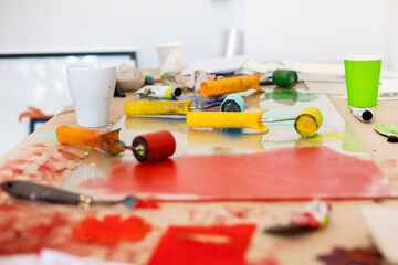 desktop graphics with paints, roller and glass