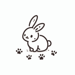 Obraz premium Cute bunny with footprints sitting on the ground in a playful pose 