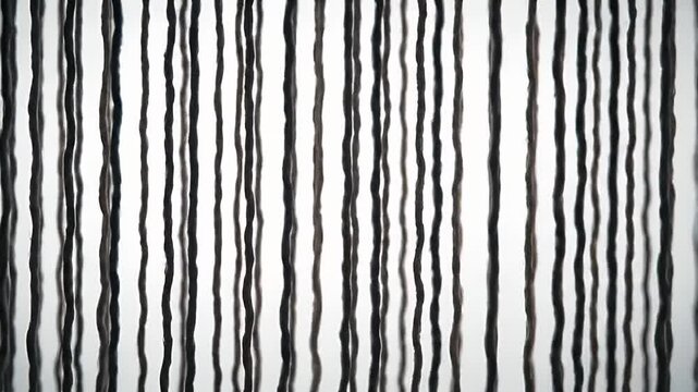 Vertical lines of textured, wavy strands