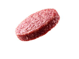 Close up of a raw uncooked beef burger patty with a textured pink surface and a fresh natural appearance