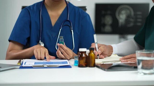 Medical team working on digital tablet healthcare doctor technology tablet using computer analyzed the results of medical reports at the hospital. - Powered by Adobe