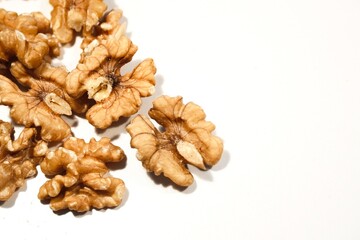 Organic Peeled Walnuts on White Table.