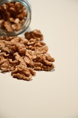 Organic Peeled Walnuts on White Table.
