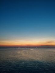 Serene seascape showing the calm ocean and clear sky in the late afternoon. Peaceful coastal view with natural daylight.