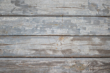 Wooden background. The picture shows a background made of an old cracked wooden board, which looks very expressive and authentic.