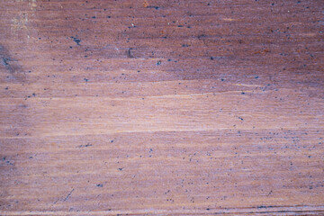 Old painted wood with crumbling paint. Wooden background.
