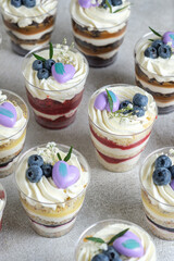 Trifles, assortment of 4 flavors: red velvet with raspberries, chocolate with caramel, vanilla with...