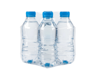 Four bottles of water in plastic pack isolated on transparent background