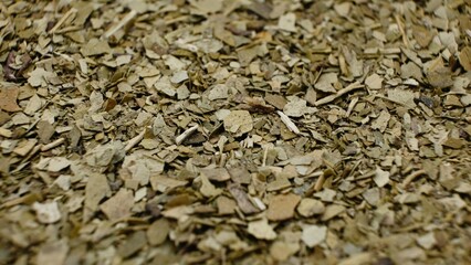 Close-Up of Dried Yerba Mate Leaves - Herbal Tea Background 