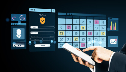 Person using mobile device with digital calendar, payment form, and data interface on dark background for online business and technology concept.