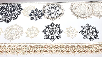 Fototapeta premium Various lace designs displayed on a clean white surface, ideal for use in textile or design contexts