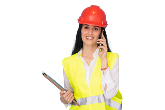 Smiling female architect wearing safety helmet and vest talking on phone and holding clipboard on transparent background, perfect cut-out for easy editing