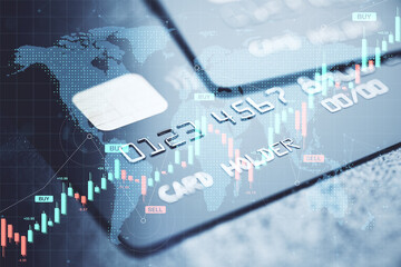 Digital credit card overlay with forex market data, candlestick chart and global map background representing global financial trade concept.