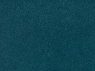 A serene expanse of cobalt whispers tranquility in this textured blue paper close-up