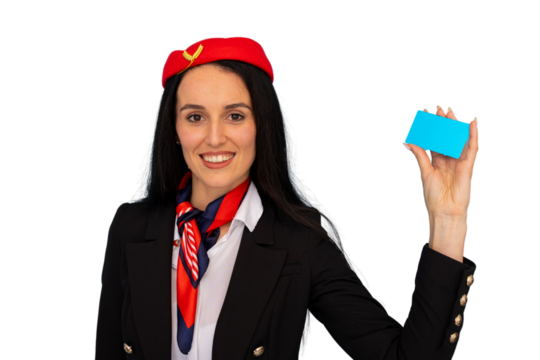 Cheerful flight attendant holding a blue credit card, promoting cashless transactions during air travel, on a transparent background