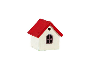 Mini house with red roof isolated on white background.