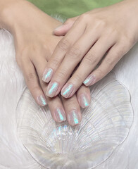 Naklejka premium woman hands with nail polish