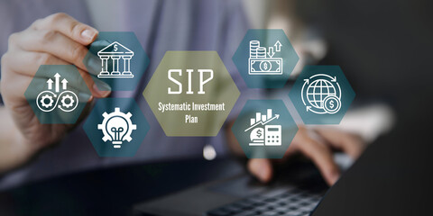 A business person using laptop with SIP Systematic Investment Plan concept.