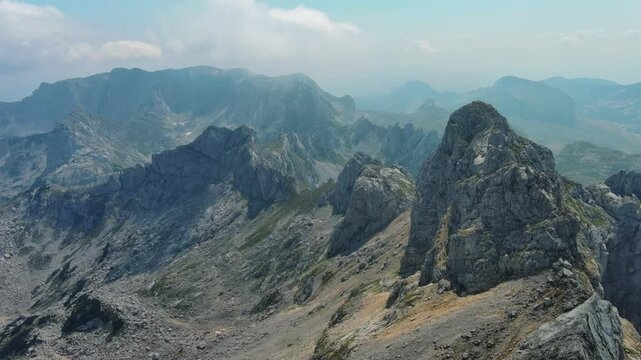 Flying in Durmitor mountains. Durmitor National park in Montenegro. Beautiful aerial mountain landscape, 4k