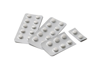 複数枚並んだ未開封の白い錠剤シート