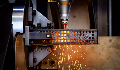 CNC Laser and gas cutting of metal, modern industrial technology.