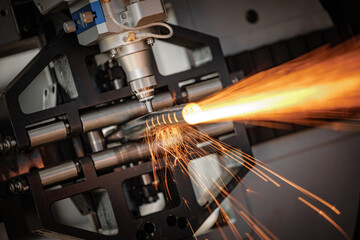 CNC Laser and gas cutting of metal, modern industrial technology.