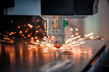 CNC Laser cutting of metal, modern industrial technology.