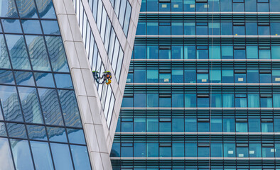 Professional Window cleaners at work.