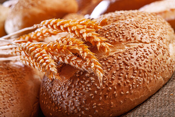 Fresh baked bread. Assorted bakery products loafs of bread and rolls...