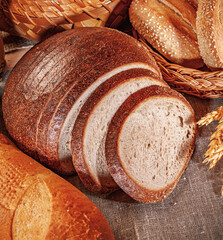 Fresh baked bread. Assorted bakery products loafs of bread and rolls...
