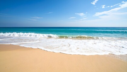 Fototapeta premium Tropical beach with turquoise sea and golden sand on a sunny day