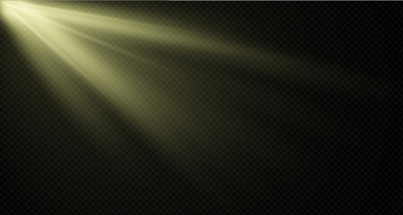 Spotlight on the stage or divine particle rays isolated on a black transparent background. The glow of the rays