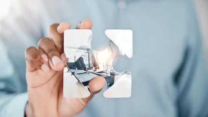 Business Puzzle Solution: A person's hand carefully places a piece of a transparent puzzle, revealing a collaborative business team working efficiently within a modern office environment. - Powered by Adobe