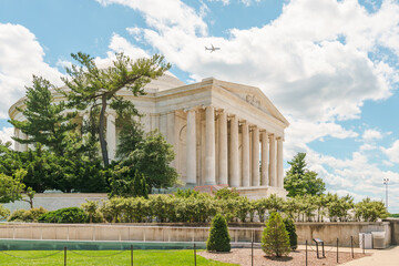 Close-up of Jefferson Memorial with trees and sky in Washington D.C..