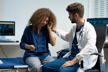 Obraz premium Stressed woman patient are treated by a psychologist or psychiatrist in a psychiatric clinic or hospital.