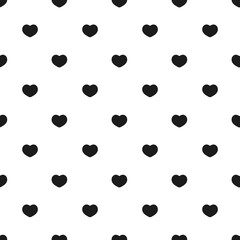 Seamless black heart pattern on white background. Minimalist romantic repeat design perfect for fabric, wallpaper, wrapping paper, and Valentine's Day themes.