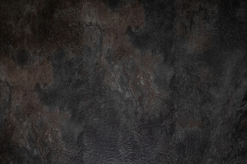 Dark slate stone texture background shot from top view

