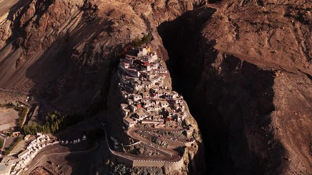 Aerial view of Diskit Monastery perched dramatically on a rocky hilltop in Nubra.