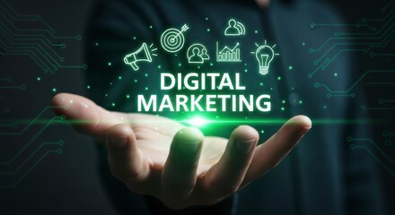 Human hand holding glowing digital marketing text and icons for online business strategy