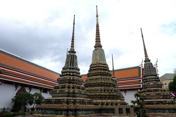 Naklejka premium Wat Pho or Pho temple, an ancient temple, Buddha, Wat Phra Chetuphon Wimon Mangkhalaram, Buddhism, religion, architecture, exterior, Bangkok, Thailand, Thailand Destination