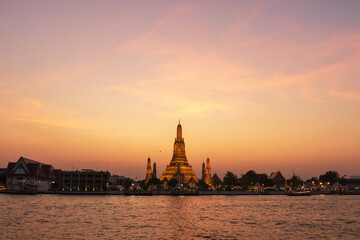Wat Arun Ratchawararam Ratchawaramahawihan or Wat Arun (Temple of Dawn) is a Buddhist temple along the Chao Phraya river at twilight in Bangkok, Thailand.